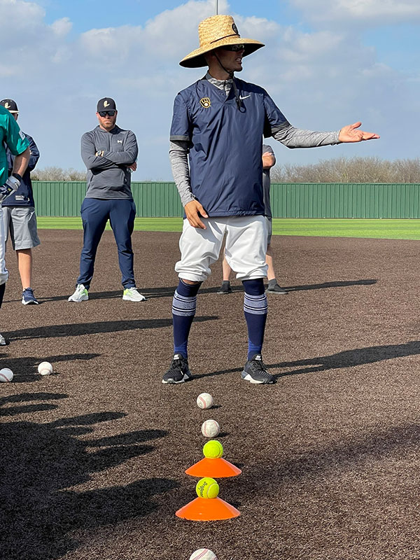 Nate teaching ground balls