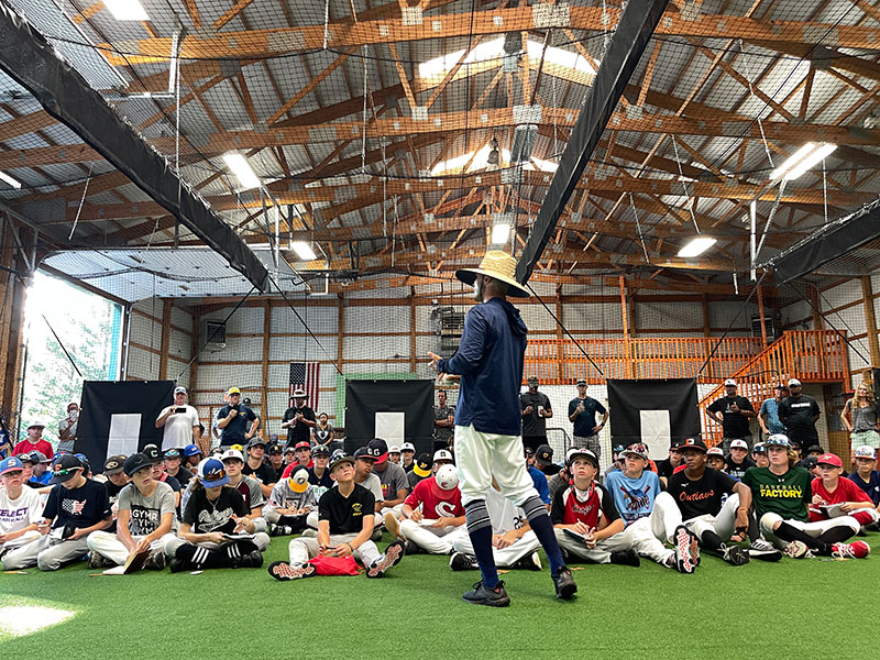 Nate Speaking to Camp Indoors