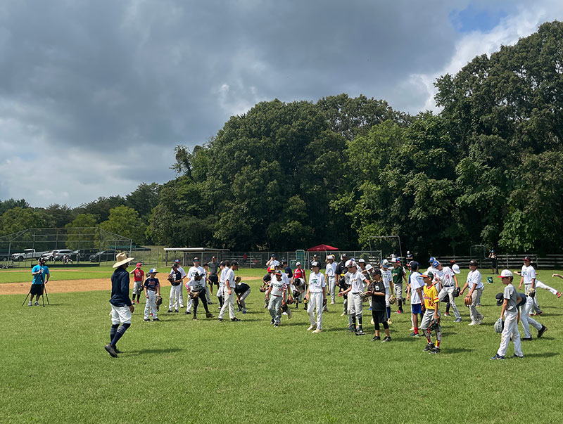 Nate teaching on field